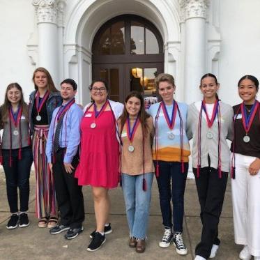 group of students with awards